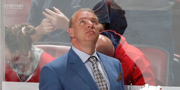 SUNRISE, FL - APRIL 5: Head coach Michel Therrien of the Montreal Canadiens watches a replay during a break in action against the Florida Panthers at the BB&T Center on April 5, 2015 in Sunrise, Florida. The Canadiens defeated the Panthers 4-1. (Photo by Joel Auerbach/Getty Images)