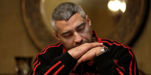 Canadian Al-Jazeera English journalist Mohamed Fahmy, pauses during an interview with The Associated Press in Cairo, Egypt, Thursday, Feb. 19, 2015. Al-Jazeera journalists Fahmy and Baher Mohammed are free pending their retrial, scheduled for Feb. 23. A third colleague, Peter Greste, was released two weeks ago and deported to his home country of Australia. (AP Photo/Hassan Ammar)