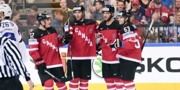 Forward Tyler Seguin (2nd R) of Canada celebrates with his teammates after scoring a goal during the group A preliminary round match France vs Canada at the 2015 IIHF Ice Hockey World Championships on May 9, 2015 at the O2 Arena in Prague. AFP PHOTO / JONATHAN NACKSTRAND (Photo credit should read JONATHAN NACKSTRAND/AFP/Getty Images)