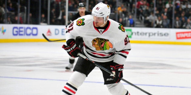 November 29, 2014; Los Angeles, CA, USA; Chicago Blackhawks center Brad Richards (91) takes a shot on goal against the Los Angeles Kings during the second period at Staples Center. Mandatory Credit: Gary A. Vasquez-USA TODAY Sports