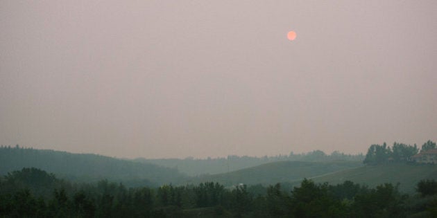 Smoke from the forest fires west of us settled deep into the city today. Looked like Blade Runner.