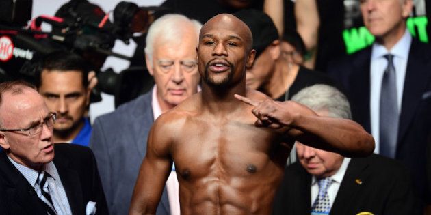 Sep 11, 2015; Las Vegas, NV, USA; Floyd Mayweather weighs in for his upcoming boxing fight against Andre Berto (not pictured) at MGM Grand Garden Arena. Mandatory Credit: Joe Camporeale-USA TODAY Sports