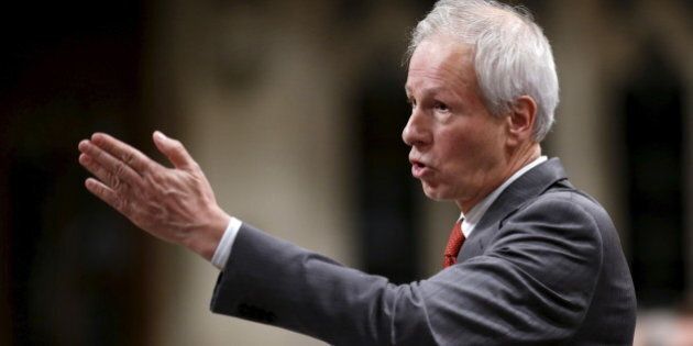 Canada's Foreign Minister Stephane Dion speaks during Question Period in the House of Commons on Parliament Hill in Ottawa, Canada, December 8, 2015. REUTERS/Chris Wattie