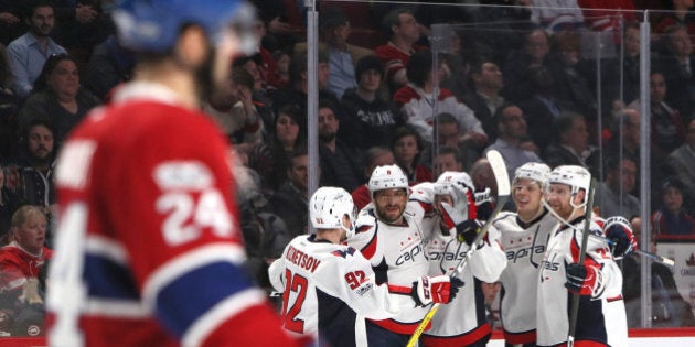 Jan 9, 2017; Montreal, Quebec, CAN; Washington Capitals right wing Brett Connolly (10) celebrates his goal against Montreal Canadiens with teammates during the third period at Bell Centre. Mandatory Credit: Jean-Yves Ahern-USA TODAY Sports