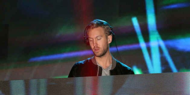 Calvin Harris performs during the Power 96.1 Jingle Ball at the Arena at Gwinnett Center on Friday, Dec. 19, 2014, in Atlanta. (Photo by Robb D. Cohen/Invision/AP)