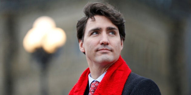 Canada's Prime Minister Justin Trudeau takes part in a World AIDS Day flag raising ceremony on Parliament Hill in Ottawa, Ontario, Canada, December 1, 2016. REUTERS/Chris Wattie