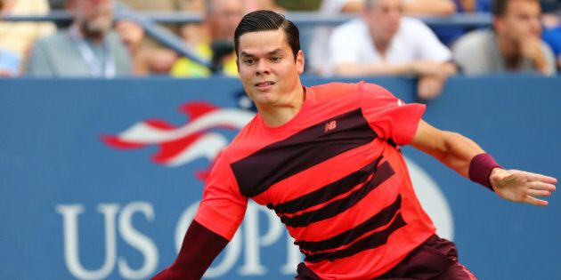 NEW YORK, NY - SEPTEMBER 04: Milos Raonic of Canada returns a shot against Feliciano Lopez of Spain during their Men's Singles Third Round match on Day Five of the 2015 US Open at the USTA Billie Jean King National Tennis Center on September 4, 2015 in the Flushing neighborhood of the Queens borough of New York City. (Photo by Elsa/Getty Images)