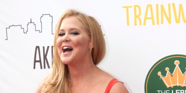 Actress Amy Schumer arrives at a special screening of the new comedy, "Trainwreck" at the Regal Cinemas Montrose Stadium 12 theaters, on Friday, July 10, 2015, in Akron, Ohio. Basketball player LeBron James is hosting the screening of the film that he co-stars in with Schumer and Bill Hader. (Photo by Phil Long/Invision/AP)