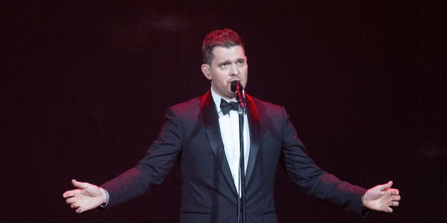 AUSTIN, TX - AUGUST 03: Singer-songwriter Michael BublÃ© performs in concert at the Frank Erwin Center on August 3, 2014 in Austin, Texas. (Photo by Rick Kern/WireImage)