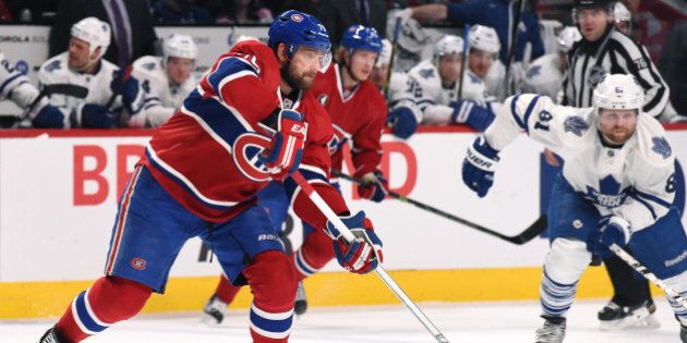 MONTREAL, QC - FEBRUARY 28: Andrei Markov #79 of the Montreal Canadiens passes the puck against the Toronto Maple Leafs in the NHL game at the Bell Centre on February 28, 2015 in Montreal, Quebec, Canada. (Photo by Francois Lacasse/NHLI via Getty Images)