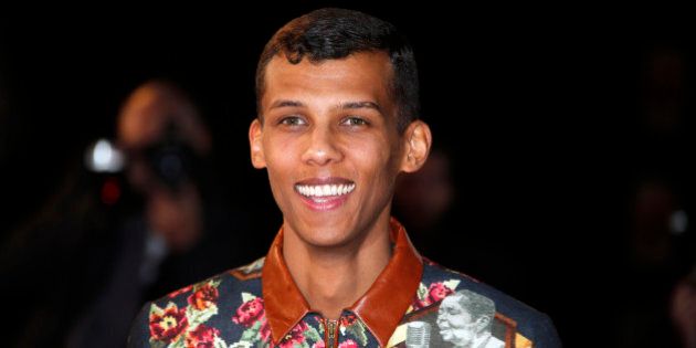 Belgian singer Stromae arrives for the NRJ Music Awards ceremony at the Festival Palace in Cannes December 13, 2014. REUTERS/Eric Gaillard (FRANCE - Tags: ENTERTAINMENT)