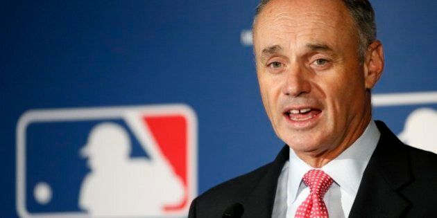 MLB Commissioner Rob Manfred talks about new rules aimed at speeding up play of baseball games among other major topics of conversation at spring training media day Monday, Feb. 23, 2015, in Phoenix. (AP Photo/Ross D. Franklin)