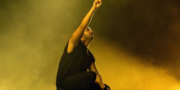 INDIO, CA - APRIL 12: Rapper Drake performs onstage during day 3 of the 2015 Coachella Valley Music & Arts Festival (Weekend 1) at the Empire Polo Club on April 12, 2015 in Indio, California. (Photo by Kevin Winter/Getty Images for Coachella)