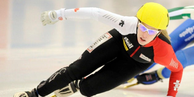 Winner Marianne St-Gelais of Canada competes during the 500 meter women's final race at the Short Track Speed Skating World Cup in Dresden, Sunday, Feb. 20, 2011. (AP Photo/Jens Meyer)