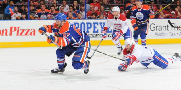 EDMONTON, AB - OCTOBER 29: Benoit Pouliot #67 of the Edmonton Oilers scores the game tying goal against the Montreal Canadiens on October 29, 2015 at Rexall Place in Edmonton, Alberta, Canada. (Photo by Andy Devlin/NHLI via Getty Images)