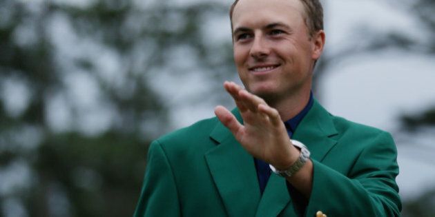AUGUSTA, GA - APRIL 12: Jordan Spieth of the United States poses with the green jacket after winning the 2015 Masters Tournament at Augusta National Golf Club on April 12, 2015 in Augusta, Georgia. (Photo by Andrew Redington/Getty Images)