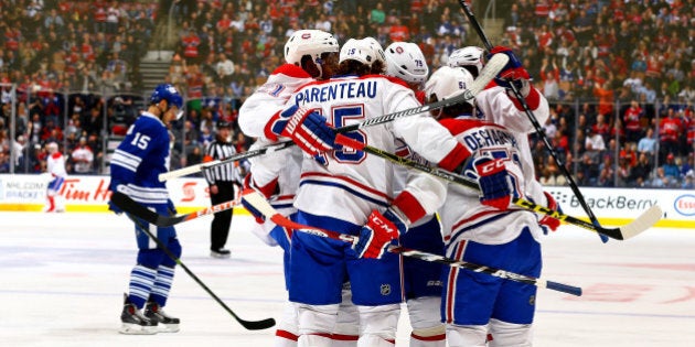 TORONTO, ON - APRIL 11: The Montreal Canadiens celebrate David Desharnais goal against the Toronto Maple Leafs during NHL action at the Air Canada Centre April 11, 2015 in Toronto, Ontario, Canada. (Photo by Abelimages/Getty Images)