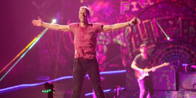 NEW YORK, NY - DECEMBER 31: Chris Martin of Coldplay performs at Barclays Center on December 31, 2012 in the Brooklyn borough of New York City. (Photo by Johnny Nunez/WireImage)