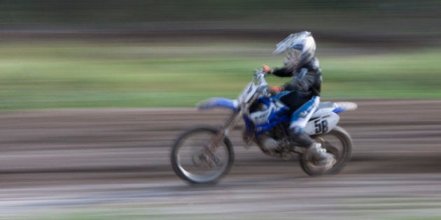 Person riding motocross bike