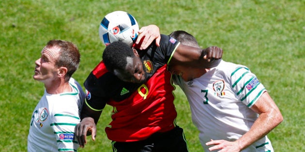 Football Soccer - Belgium v Republic of Ireland - EURO 2016 - Group E - Stade de Bordeaux, Bordeaux, France - 18/6/16Republic of Ireland's Glenn Whelan and Ciaran Clark in action with Belgium's Romelu Lukaku REUTERS/Regis DuvignauLivepic