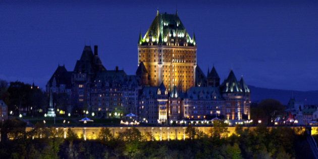 ** TO GO WITH STORY SLUGGED CANADA QUEBEC 400 AÃOS ** ** FILE ** In this file photo from Oct. 23, 2003, the Chateau Frontenac rises above the fortified walls of Quebec City, Quebec. (AP Photo/Robert F. Bukaty)