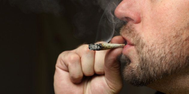 A shot of a man smoking pot.Please visit my Marijuana lightbox./file_thumbview_approve.phpsize=1&id=11835431