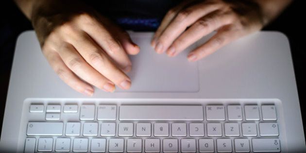 File photo dated 06/08/13 of someone using a laptop keyboard as the internet can be a "playground for paedophiles", the NSPCC has warned after new figures suggested increasing numbers of children are raising concerns about online abuse and grooming.