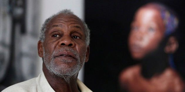 U.S actor Danny Glover speaks to The Associated Press during an interview in Lagos, Nigeria Thursday, Sept. 10, 2015. Glover is in Nigeria to star in a movie based on people who risked and sacrificed their lives to stop the spread of Ebola in Africa's most populous country. (AP Photo/Sunday Alamba)