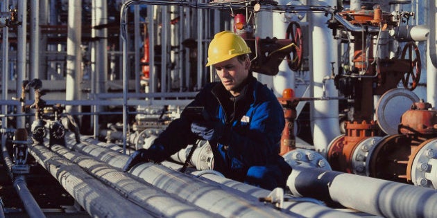 Foreman testing pipes