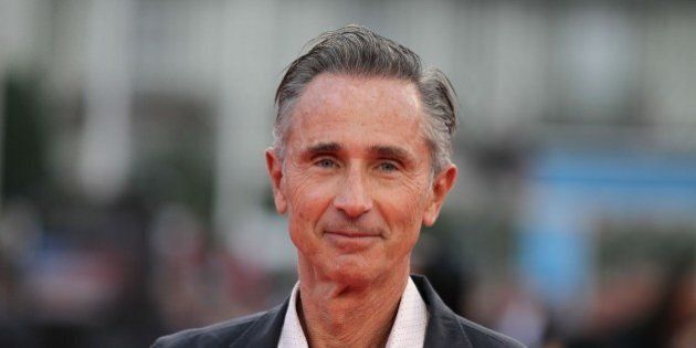 French actor Thierry Lhermitte poses on the red carpet before the screening of 'The hundred-foot journey' on September 6, 2014 during the 40th Deauville's US Film Festival in the French northwestern sea resort of Deauville. AFP PHOTO/CHARLY TRIBALLEAU. (Photo credit should read CHARLY TRIBALLEAU/AFP/Getty Images)