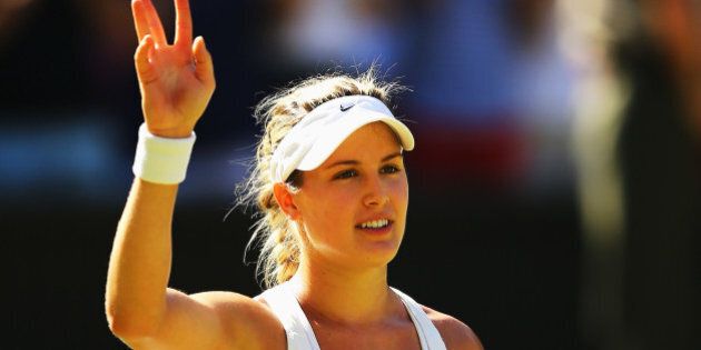LONDON, ENGLAND - JULY 03: Eugenie Bouchard of Canada celebrates after winning her Ladies' Singles semi-final match against Simona Halep of Romania on day ten of the Wimbledon Lawn Tennis Championships at the All England Lawn Tennis and Croquet Club on July 3, 2014 in London, England. (Photo by Al Bello/Getty Images)