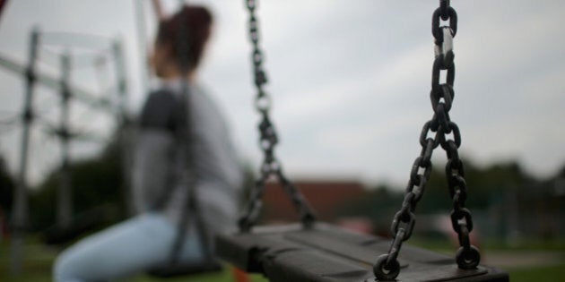 ROTHERHAM, ENGLAND - SEPTEMBER 03: (EDITORS NOTE: This image was processed using digital filters.) A teenage girl, who claims to be a victim of sexual abuse and alleged grooming, poses in Rotherham on September 3, 2014 in Rotherham, England. South Yorkshire Police have launched an independent investigation into its handling of the Rotherham child abuse scandal and will also probe the role of public bodies and council workers. A report claims at least 1,400 children as young as 11 were sexually abused from 1997- 2013 in Rotherham. (Photo by Christopher Furlong/Getty Images)