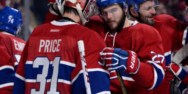 Oct 29, 2016; Montreal, Quebec, CAN; Carey Price (31) and teammate Alex Galchenyuk (27) react after defeating the Toronto Maple Leafs 2-1 at the Bell Centre. Mandatory Credit: Eric Bolte-USA TODAY Sports
