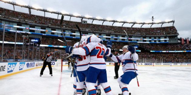 FOXBORO, MA - JANUARY 01: David Desharnais #51 of the Montreal Canadiens celebrates a goal with his teammates during the first period of the 2016 Bridgestone NHL Classic at Gillette Stadium on January 1, 2016 in Foxboro, Massachusetts. (Photo by Dave Sandford/NHLI via Getty Images)