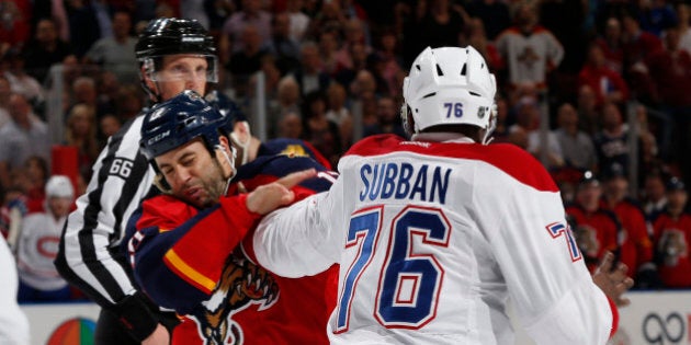 SUNRISE, FL - DECEMBER 29: P.K. Subban #76 of the Montreal Canadiens lands a punch on Derek MacKenzie #17 of the Florida Panthers during a first period fight at the BB&T Center on December 29, 2015 in Sunrise, Florida. (Photo by Joel Auerbach/Getty Images)