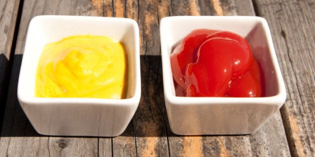 A side of ketchup and a side of mustard.