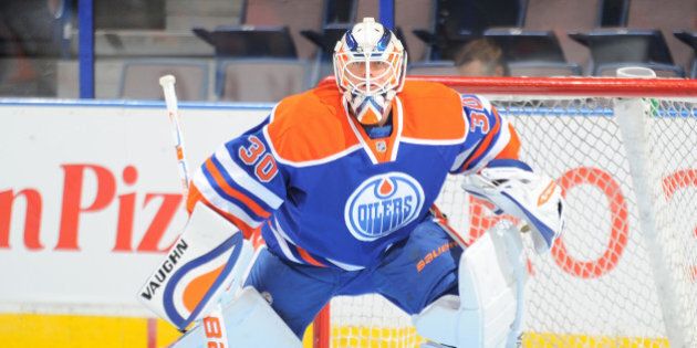 EDMONTON, AB - SEPTEMBER 29: Ben Scrivens #30 of the Edmonton Oilers warms up prior to a preseason game against the Arizona Coyotes on September 29, 2015 at Rexall Place in Edmonton, Alberta, Canada. (Photo by Andy Devlin/NHLI via Getty Images)