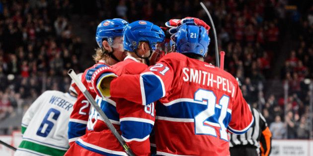 MONTREAL, QC - NOVEMBER 16: Lars Eller #81 of the Montreal Canadiens celebrates a shorthanded goal with teammates during the NHL game against the Vancouver Canucks at the Bell Centre on November 16, 2015 in Montreal, Quebec, Canada. (Photo by Minas Panagiotakis/Getty Images)