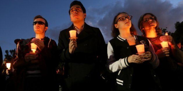 LONG BEACH, CA - NOVEMBER 15: Students and mourners hold candles to honor Nohemi Gonzalez, 23, who was killed during the attacks in Paris, on November 15, 2015 in Long Beach, California. Gonzalez, from El Monte, California, was a senior at CSULB studying design and attending Strate College of Design during a semester abroad program. At least 129 peope died on November 13 when three teams of terrorists attacked multiple locations around Paris. (Photo by Sandy Huffaker/Getty Images)