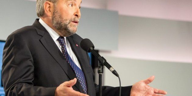 NDP leader Tom Mulcair speaks to reporters during a press conference following the first federal leaders debate of the 2015 Canadian election campaign in Toronto, August 6, 2015. Canadians are set to go to the polls on October 19, 2015. AFP PHOTO / GEOFF ROBINS (Photo credit should read GEOFF ROBINS/AFP/Getty Images)