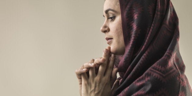 Portrait of young woman wearing hijab head scarf