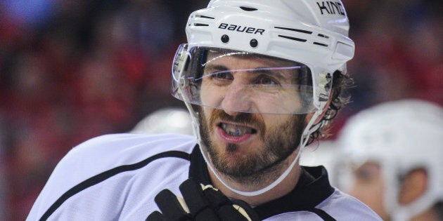 CALGARY, AB - APRIL 9: Mike Richards #10 of the Los Angeles Kings skates against the Calgary Flames during an NHL game at Scotiabank Saddledome on April 9, 2015 in Calgary, Alberta, Canada. The Flames defeated the Kings 3-1. (Photo by Derek Leung/Getty Images)