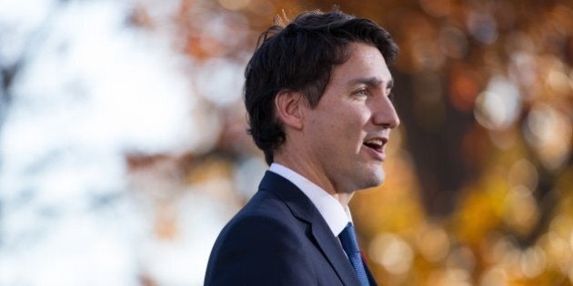 Canadian Prime Minister Justin Trudeau speaks at a press conference at Rideau Hall after being sworn in as Canada's 23rd Prime Minister in Ottawa, Ontario, November 4, 2015. AFP PHOTO/ GEOFF ROBINS (Photo credit should read GEOFF ROBINS/AFP/Getty Images)