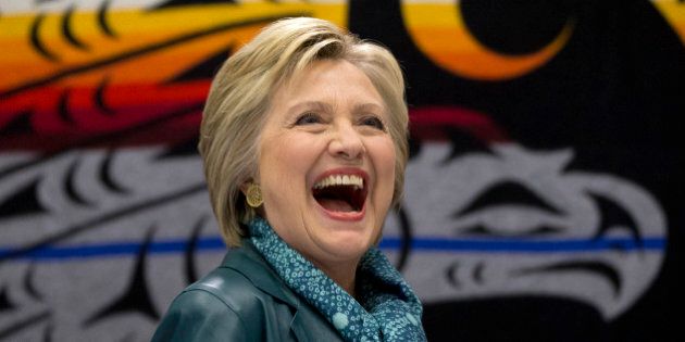 Democratic presidential candidate Hillary Clinton laughs as she participates in a roundtable with Washington Tribal Leaders at Chief Leschi School in Puyallup, Wash., Tuesday, March 22, 2016. (AP Photo/Carolyn Kaster)