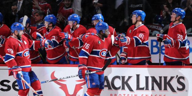 MONTREAL, QC - APRIL 17: P.K. Subban #76 of the Montreal Canadiens celebrates his second period goal with teammates in Game Two of the Eastern Conference Quarterfinals during the 2015 NHL Stanley Cup Playoffs at the Bell Centre on April 17, 2015 in Montreal, Quebec, Canada. (Photo by Richard Wolowicz/Getty Images)