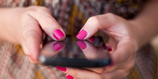 Beautiful women Surfing Internet Concept. Young beautiful women lady touching and browsing her smart phone. Woman chatting with her friends by her smartphone