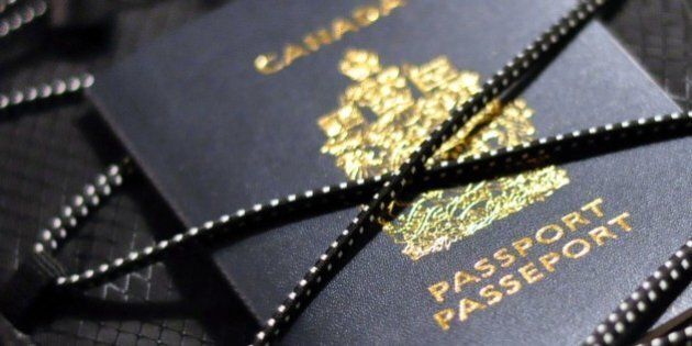 Canadian passport tucked insidebungee cord of backpack