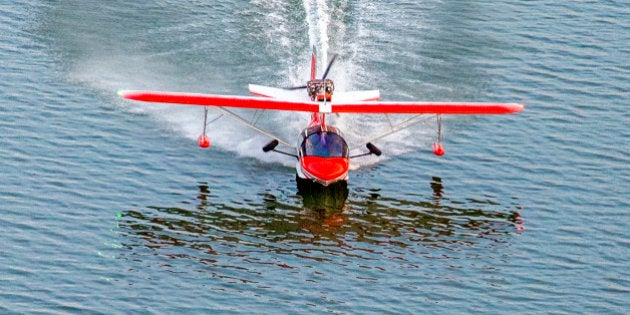 A small seaplane landing on the Chesapeake Bay, in Maryland, USA.