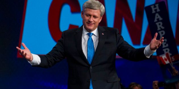 Conservative Leader Stephen Harper, Canada's prime minister, gestures during a news conference where he conceded victory on election day in Calgary, Alberta, Canada, on Monday, Oct. 19, 2015. Justin Trudeau's Liberal Party has swept into office with a surprise majority, ousting Prime Minister Stephen Harper and capping the biggest comeback election victory in Canadian history. Photographer: Ben Nelms/Bloomerg