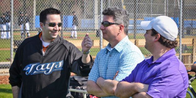 Feb 16 2011- An animated Blue Jays G.M. Alex Anthopoulos talks with Tony LaCava, and Director of Pro Scouting Perry Minasian (right) during the 3rd day at the Cecil B. Englebert Complex, in Dunedin, as pitchers and catchers report for spring training. (Photo by David Cooper/Toronto Star via Getty Images)